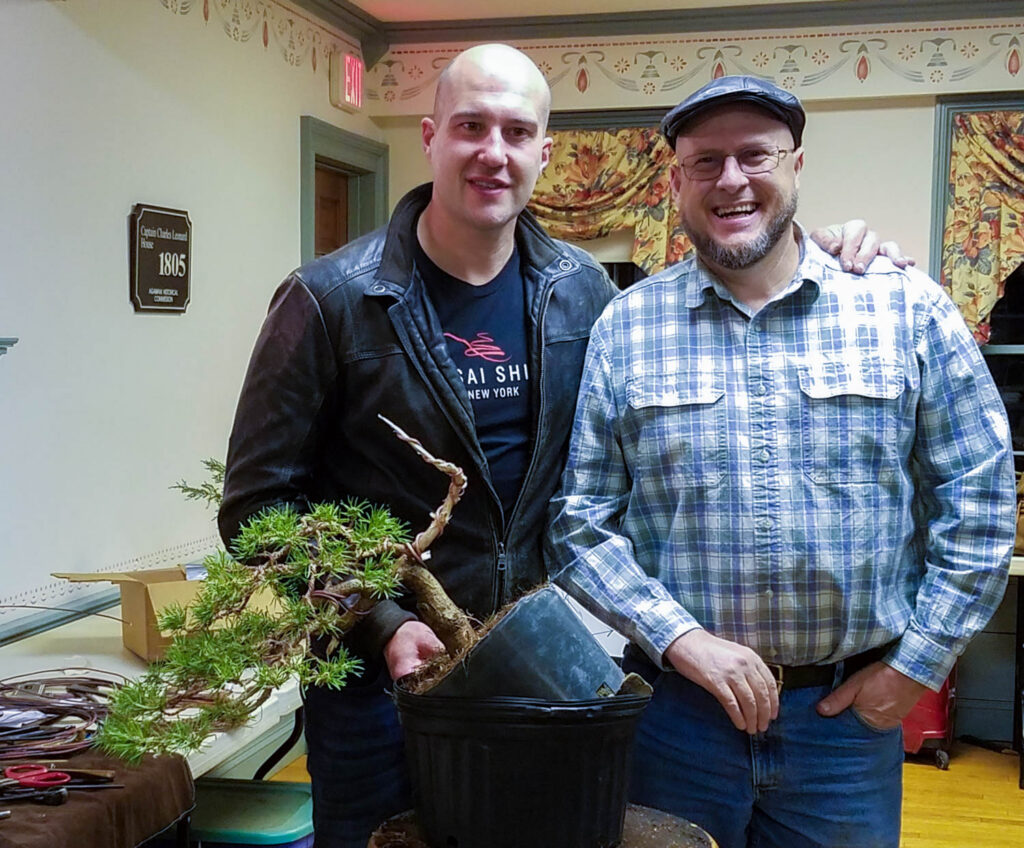 group photo with wired tree